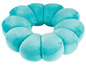 Een turquoise donutvormig kussen voor extra comfort.