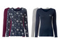 Drie longsleeves: een met een sterrenprint, een effen donkerblauwe en een grijze.