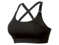 Een zwarte sportbeha met gekruiste bandjes.