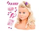 Een blonde pop met een make-up set, haaraccessoires en stickers.