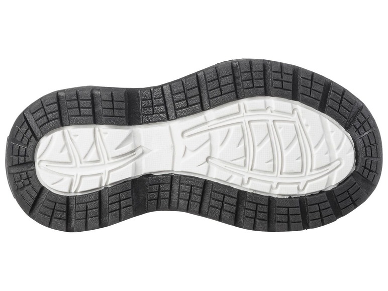 Zwarte rubberen zool van een sneaker met wit profiel.