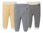 Drie gestreepte baby leggings in grijs, zwart-wit en geel-wit.