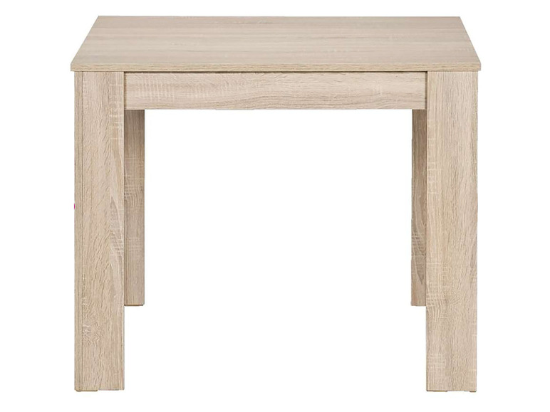 Een houten eettafel met een lichte, natuurlijke afwerking.