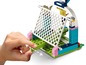 Lego Friends set met een voetbaldoel en een speelfiguur.