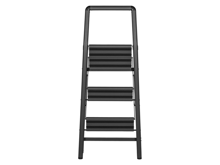 Een zwarte, metalen trap met drie treden.