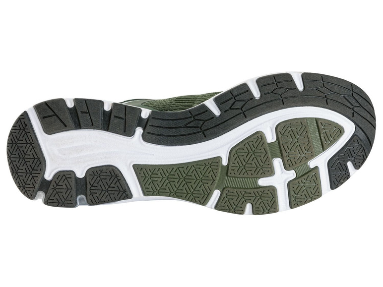 Onderkant van een groene hardloopschoen met een wit en zwart profiel.