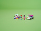 Lego Friends set met een salon en een auto.