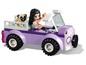 LEGO Friends auto met een figuur, een hondje en accessoires.