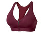 Een donkerrode sportbeha met rits.