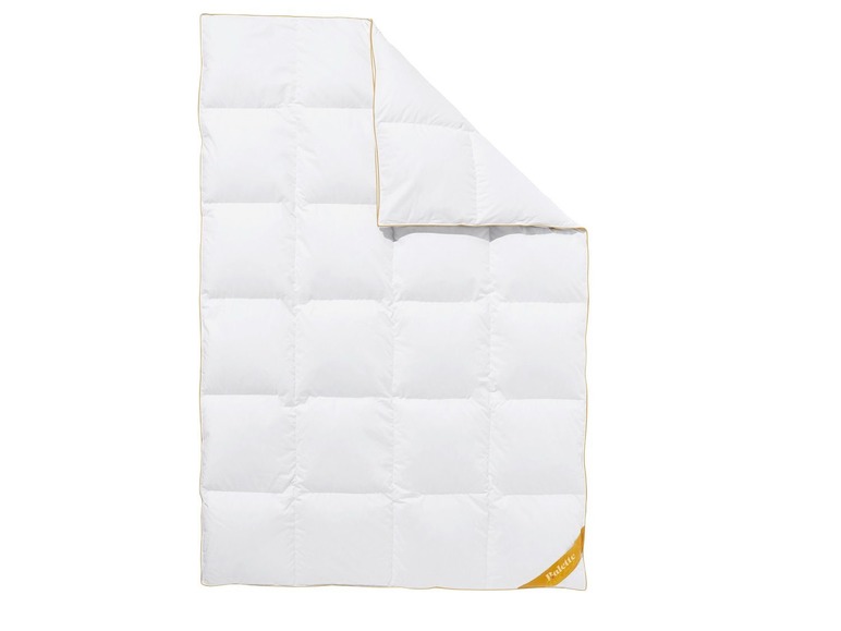 Een witte donsdeken van het merk 