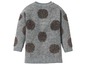 Grijze gebreide trui met glitter stippen.