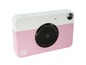 Een roze en witte Kodak Printomatic instant camera.