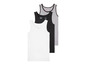 Drie tanktops, wit, zwart en gestreept.