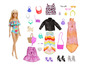 Barbiepop met zwempak, kleding en accessoires.