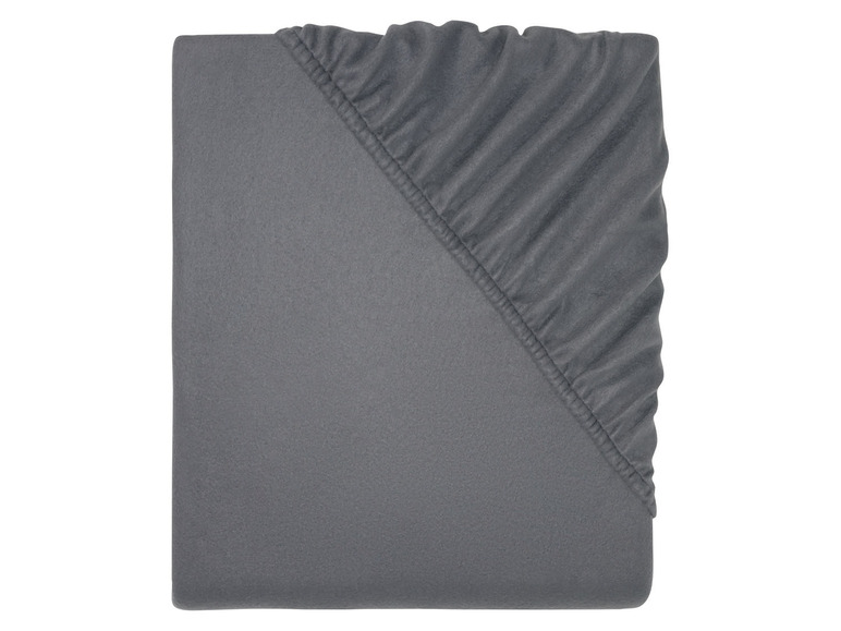 Een grijze flanellen hoeslaken voor een matras.