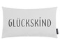Een grijze kussen met de tekst 'Glückkind' van Magma.