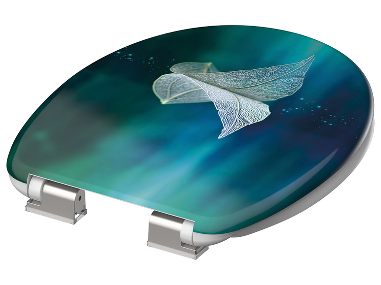 Toiletbril met een bladerenmotief in blauwgroene tinten.