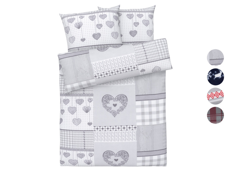Een grijs beddengoedset met hartjes en ruitjes