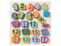Een houten puzzel met getallen van 1 tot en met 20.