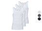 Drie witte tanktops van Livergy.