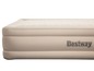 Een beige luchtbed van Bestway met een geribbeld oppervlak.