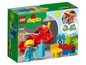 Lego Duplo speelgoed met een rood vliegtuig, een figuur en accessoires.