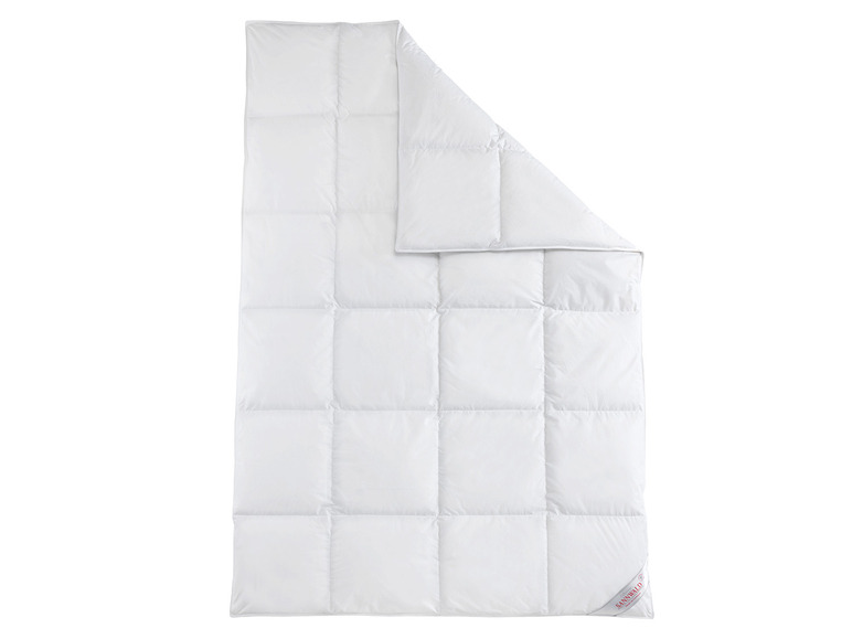Een witte donsdeken van het merk Sanibel.