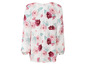 Wit bloesje met lange mouwen en bloemenprint.