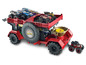 Een rode Hot Wheels Monster Trucks transportwagen met meerdere Monster Trucks.