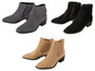 Zwarte en grijze enkellaarsjes en beige Chelsea boots.
