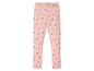 Roze leggings met hartjesprint.