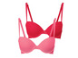 Twee bh's in roze en rood met kant.