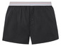 Zwarte boxershorts met knopen en een gestreepte tailleband.