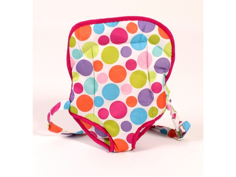 Een roze kinderstoel met vrolijke stippen.