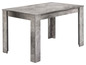 Een grijze eettafel met een betonlook.