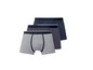 Drie boxershorts in grijs, donkerblauw en een donkerblauw patroon.