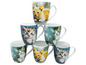 Zes witte mokken met afbeeldingen van kittens.