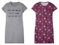 Twee t-shirts met een zon, maan en sterren print.