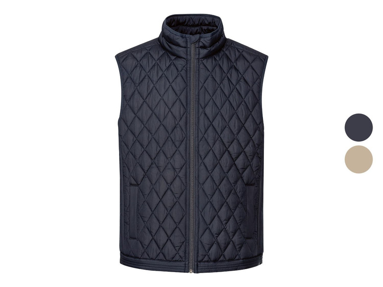 Een donkerblauwe gewatteerde herenvest met ritssluiting.