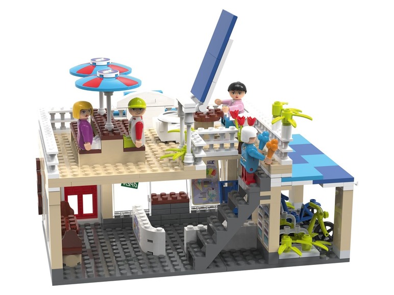 Lego-bouwset met een café met terras en fietsen.