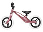 Een roze Lionelo Education loopfiets met witte banden.