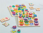 Houten puzzels met letters en cijfers tot 20.