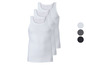 Drie witte tanktops van Livergy.
