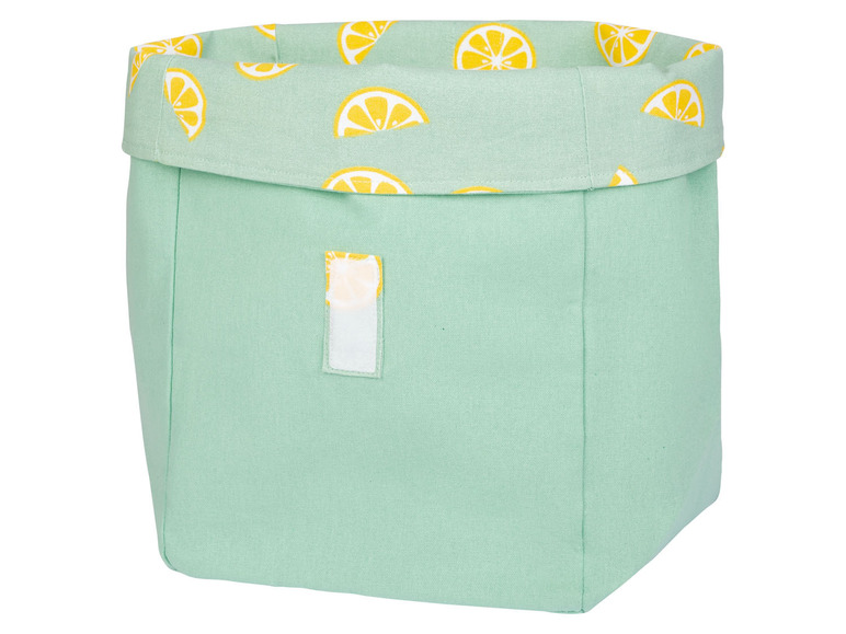 Een groene opbergmand met citroendesign.