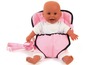 Een babypop in een roze draagzak met witte ruitjes.
