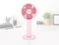 Een roze draagbare ventilator van Unoid.