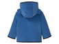 Blauw corduroy jack met capuchon voor baby's.