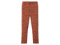Bruine leggings met zwarte stippen.