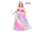Barbie-pop met een regenboogjurk en ster-motief.