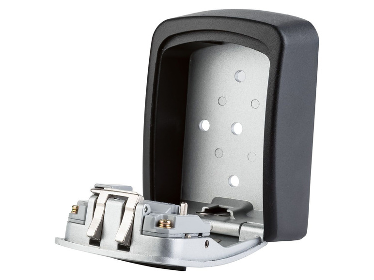 Een openstaande zwarte sleutelkluis met een zilveren binnenkant.